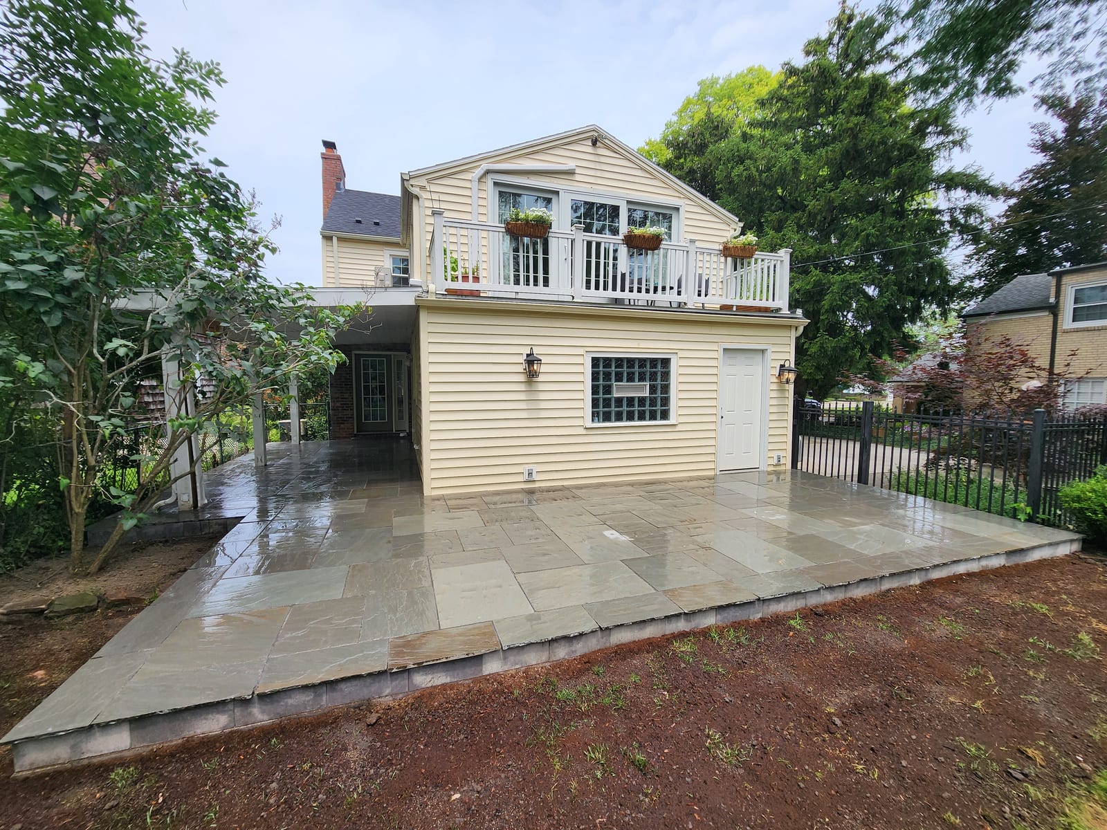 Bluestone patio with covered porch